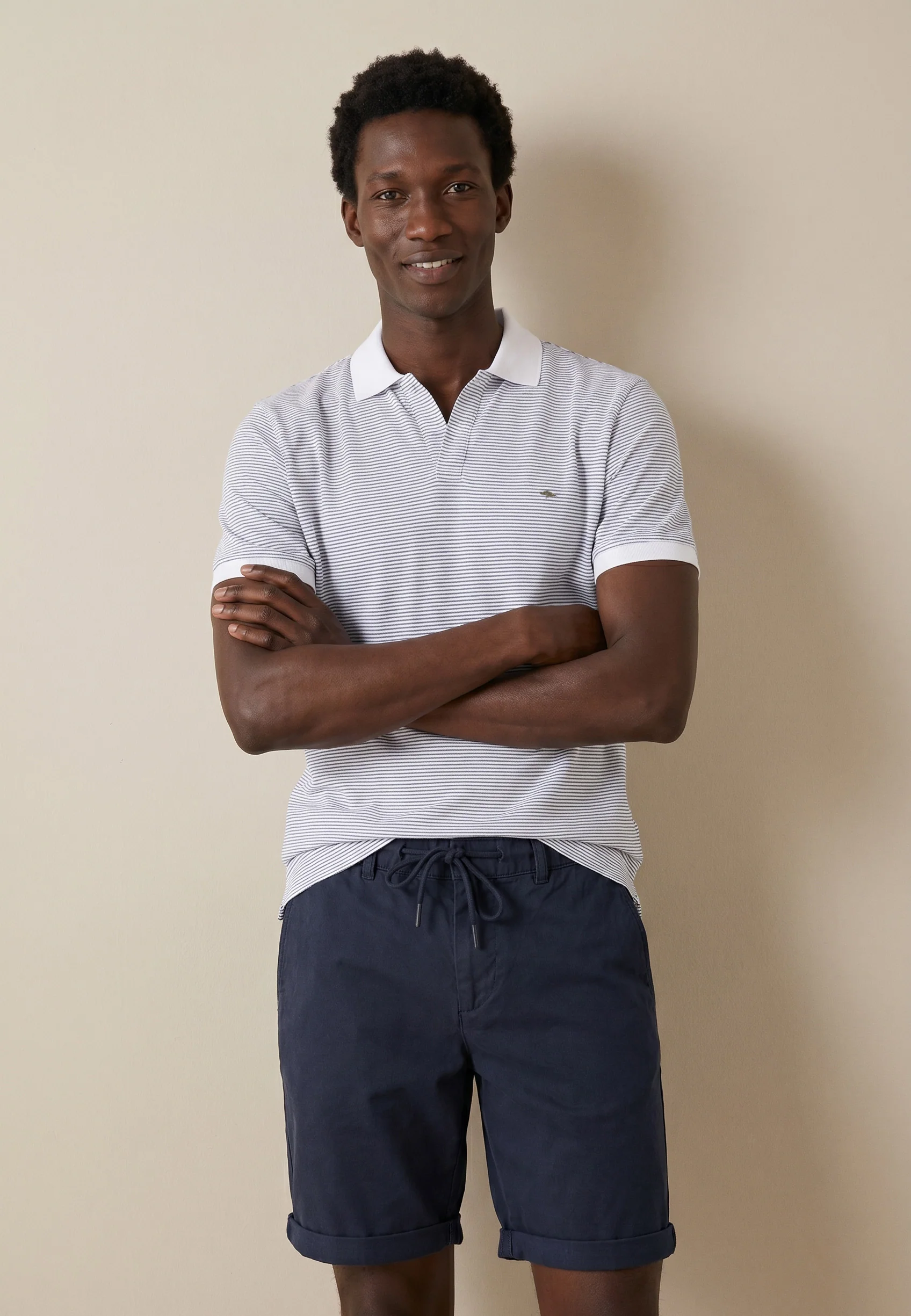Poloshirt aus Baumwolle mit Slub-Webart und Streifenmuster